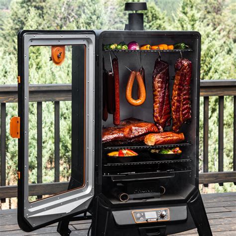 The double-walled, cold rolled steel cabinet has a hammertone copper finish with a. . Pit boss sportsman 7series wood pellet vertical smoker